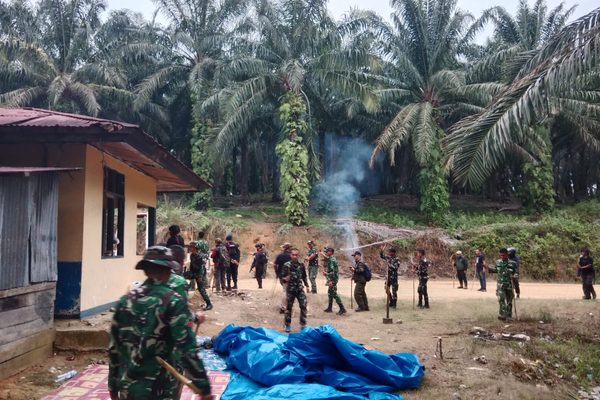 Tim Gabungan Brimob, TNI, dan Perusahaan Tertibkan Lahan di Simangambat, Sita Senjata Tajam dan Sabu
